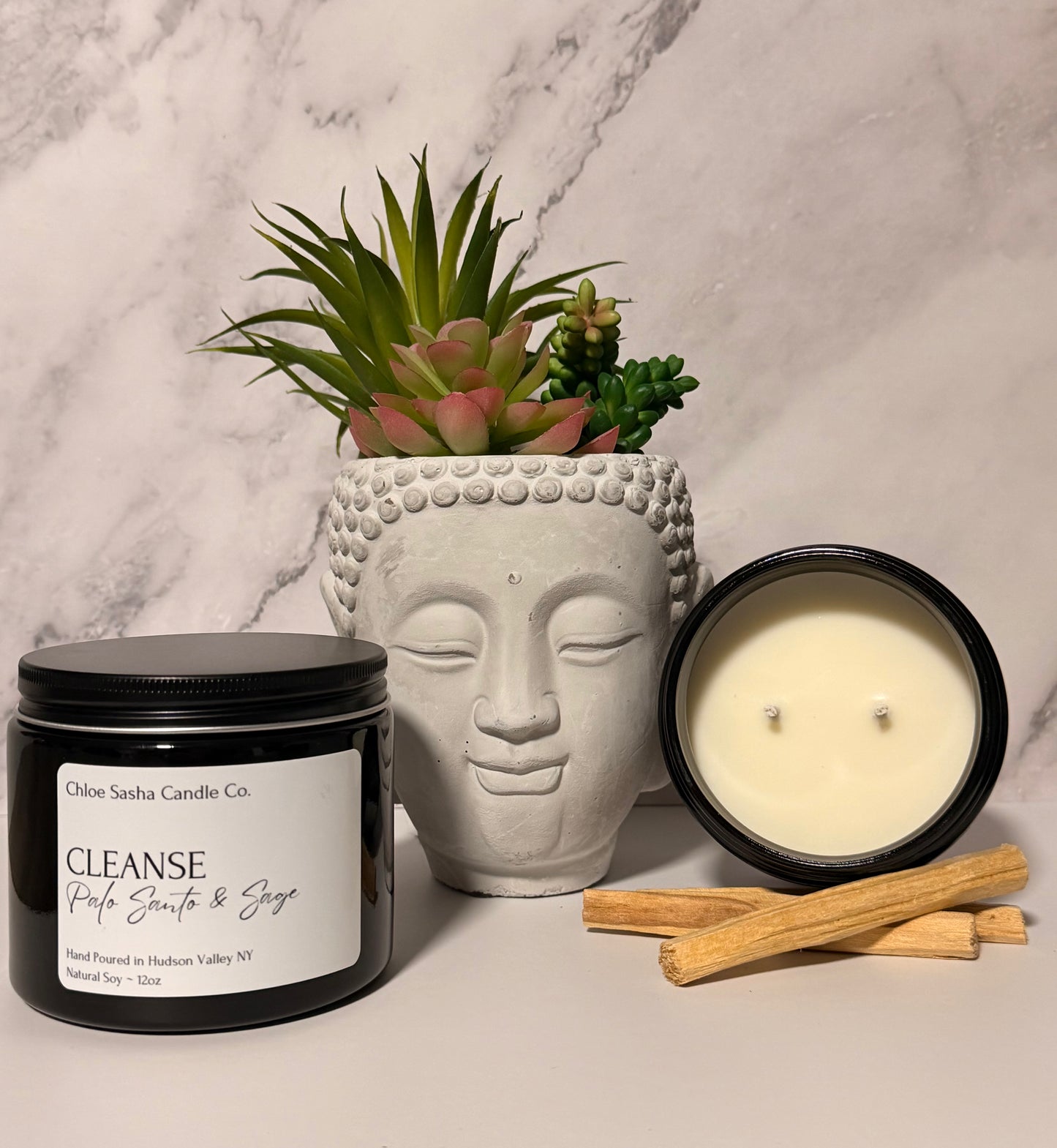 Cleanse hand poured natural soy candle. Earthy palo santo meets grounding sage in this deeply purifying blend a sacred union of woodsy warmth and herbal clarity. 