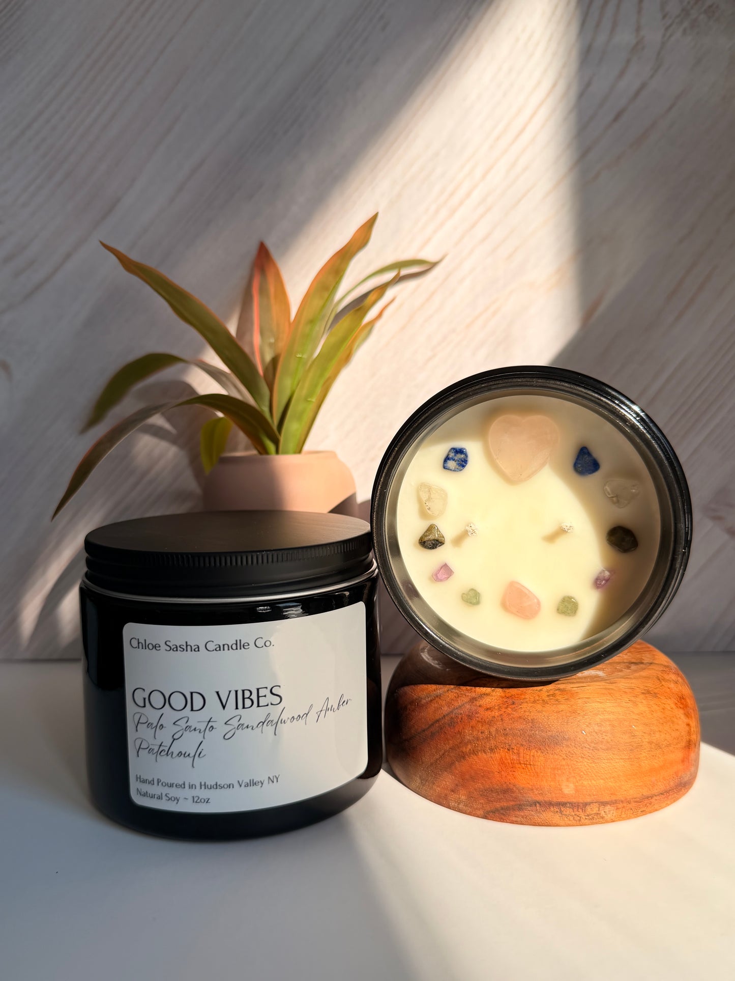 Good Vibes-crystal infused hand poured natural soy candle. This scent was created to bring you pure positive healing energy your way. Makes a beautiful gift for you or anyone not feeling well or needing some positive affirmation. Scented with several complex fragrance oils and infused with beautiful crystals to enrich the energy throw. Notes of palo santo, sandalwood, patchouli, amber & driftwood. Pearlized white shimmer upon melting.